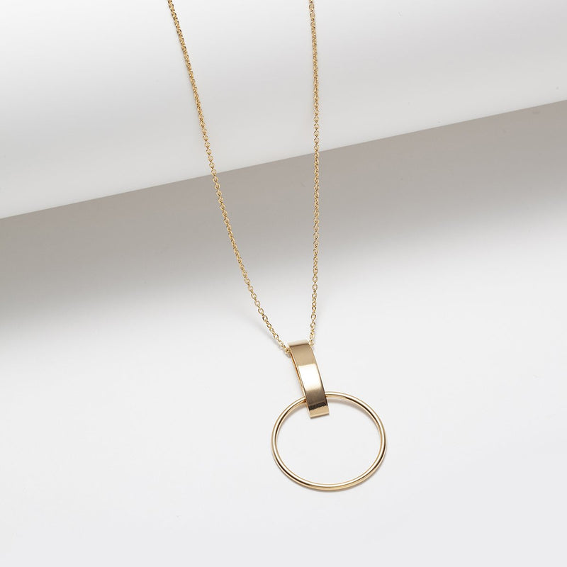 Long gold plated circle and vertical bar pendant necklace