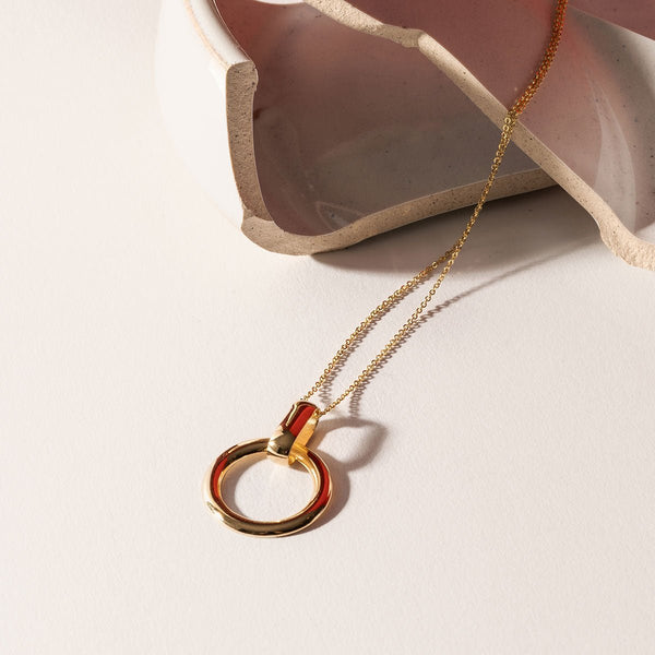 Minimalist gold plated silver necklace with a round pendant