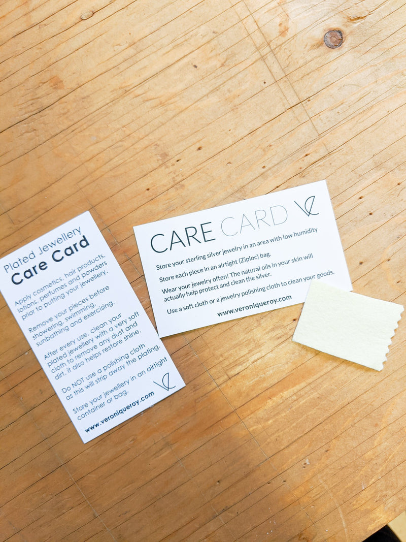 Complimentary sterling silver and gold plated care card from Ve jewelry