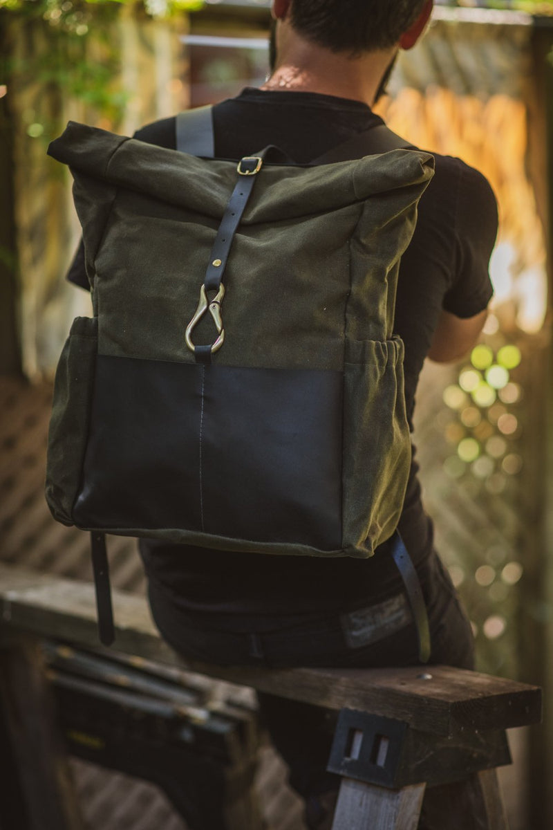 Veinage De Lorimier black leather and army green waxed canvas roll top backpack